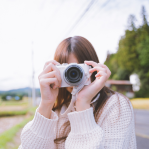 An employer taking a picture of a staff member.